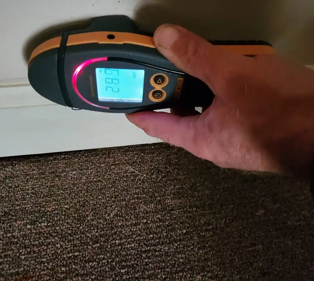 Moisture detection at baseboard during Sewage Cleanup & Sanitation in Oakland